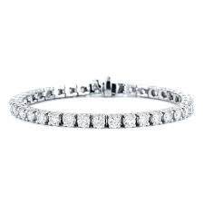 You can't really compare the cost of a tennis bracelet containt 1.5 cttw of diamonds to the price of a tennis bracelet containing 3 cttw of diamonds. Classic Diamond Tennis Bracelet Ring Concierge