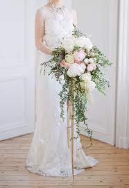 When you use a mix of stunning garden roses, some lovely scabiosa, and elegant looking calla lilies you are sure that you will contribute a lot of joy to the. A Big Floral Trend Cascading Bouquets Onefabday Com
