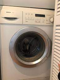 Check out below for information about some of the best gar. Can Someone Id This Bosch Axxis Compact Stacking Front Load Washer The Door Is Stuck Shut And I Can T Open It To See The Make Model Number But Repair Guy Wants Me To Give