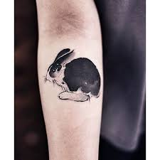 Black And White Watercolor Tattoo Watercolor Black And White Rabbit Tattoo On The Right Forearm Rabbit Tattoos Tattoos White Rabbit Tattoo