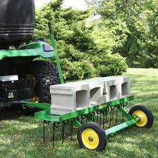 Compact design for less storage space. John Deere 40 Inch Tow Behind Dethatcher Lp42107