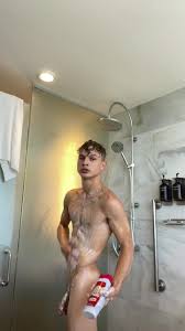 NAKED: Fit boy rubbing soap on his abs in the… ThisVid.com
