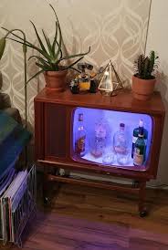 Get inspired and then you'll not only have a place for your newly acquired booze collection, you'll also have a quick weekend. Quirky Diy Transforms Obsolete Tv Into Colorful Liquor Cabinet Vintage Industrial Decor Vintage Tv Vintage Home Decor