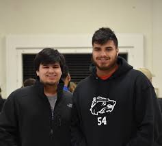 Former Coyote players come to playoff practice