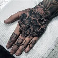 Black And Grey Hand Tattoos For Men 80 Skull Hand Tattoo Designs For Men Manly Ink Ideas Skull Hand Tattoo Hand Tattoos Tattoo Designs Men