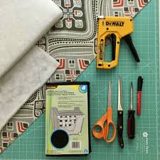 Adjust the fabric so that it falls evenly at floor level all around the chair, then press the fabric into the crevices at. No Sew Dining Chair Upholstery Tutorial Learn How To Re Upholster A Seat Cushion With Fabric And Make Your Old Chairs New Again Fabric Com Blog