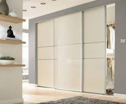 City apartment with a bank of cero sliding systems creating a glass wall. Sliding Doors Wardrobe Doors Sliding Wardrobe Doors Floor To Ceiling Wardrobes