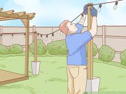 You can do this over your table or against a wall. How To Hang String Lights In A Backyard Without Trees 11 Steps