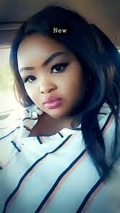 Can someone change my outfit in this picture not shorts and a swimsuit top.  Thanks.