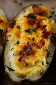 Twice Baked Potatoes Recipe These Potatoes Make Any Meal An Event They Take Baked Potatoes To A Who Baked Potato Recipes Potato Recipes Twice Baked Potatoes