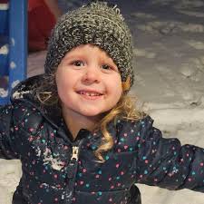 Families embrace the snow as Winter Storm Asher blankets Northeast Wisconsin