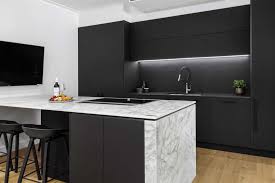 Create a modern kitchen with clean lines and minimalist decor. Display Kitchens Archives Premier Kitchens