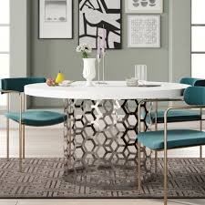 The table boasts a charming walnut and stainless steel pairing that blends well with several decor themes and color palettes. Modern 54 Inches Dining Tables Allmodern