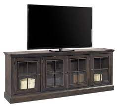 Knotty alder is characterized by large, small and star shaped knots (filled when necessary to prevent light penetration) and other natural characteristics such as mineral streaks. Knotty Alder Wood Churchill Collection 84 Television Console In Ghost Black Finish Fireplace Entertainment Fireplace Entertainment Center Television Console
