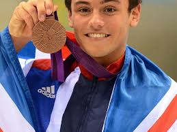 London 2012 Olympic bronze medal-winning diver Tom Daley jumps into Oldham  leisure centre plans, backing a petition for a diving board