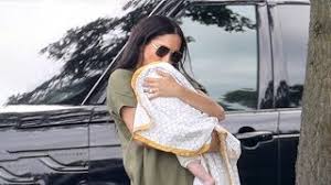 Meghan markle attends polo with baby archie to support prince harry. Meghan Markle Cradles Archie During Surprise Appearance At A Charity Polo Match Youtube