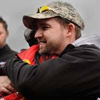 U.S. Army Cpl. Isaac Jensen gets emotional while speaking