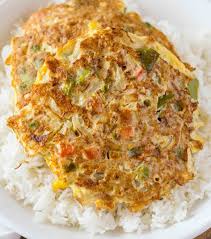 Egg Foo Young Is A Chinese Egg Omelette Dish Made With Vegetables Like Carrots Peas And Bell Pe Egg Foo Young Vegetable Egg Foo Young Recipe Leftovers Recipes