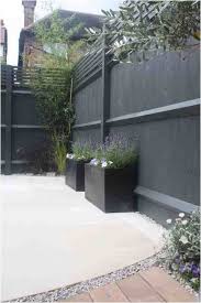 Like vines on a trellis, small trees are trained to grow flat against a wall, spreading and anchored to wire, string, or another anchor in a decorative fashion. 70 Creative Fence Decorations Ideas For Your Backyard Backyard Fences Garden Fence Colours Painted Garden Fence