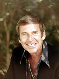 The late Paul Lynde. The voice of Mildew Wolf, The Hooded Claw & Tempelton  Rat.
