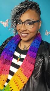 Happy FriYay from me and my very first scarf I made back in 2019. 🧶💕 Fun  fact: rainbows and butterflies are like my body armor protecting me against  any 🐂💩 that threatens