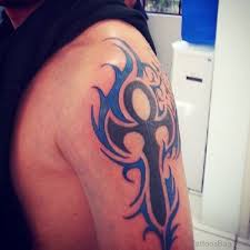 Tribal tattoos are among the most popular tattoo styles, especially for those who favor both meaning and masculinity in their tattoo designs. 70 Adorable Cross Tattoos On Shoulder