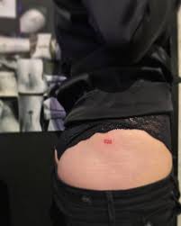 From cute hearts & roses to meaningful messages and funky designs, there has to be something to match with your personality. Tiny Number Tattoo In Red Ink