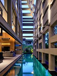 Also you may recreate it by installing a jacuzzi but it also depends on the availability of the budget. Indoor Outdoor Courtyard Swimming Pool Runs Deep Into A Modern House Idesignarch Interior Design Architecture Interior Decorating Emagazine