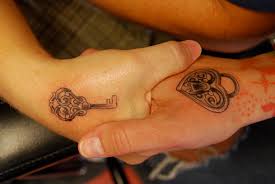 Matching tattoos for couples look adorable. Lock And Key Tattoo Design