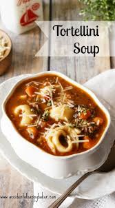 This Tortellini Soup Is So Hearty And Filling With Robust Italian Sausage Loads Of Veggies And Savory Cheese To With Images Tortellini Recipes Tortellini Soup Tortellini