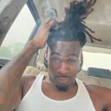 Lucas isn't thinking about his hair. He's at Max's bedside. His friends are  falling apart. He's the one holding everyone together. Grooming & wig  styling by @adventuresofzel #strangerthingshair