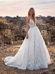 Glamorous Wedding Dress With Plunging Neckline And Decorated Tulle Glamourous Wedding Dress Wedding Dresses Stunning Wedding Dresses