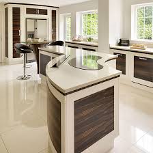 An odd shaped island should only be specified if the layout doesn't support a square or rectangle. Take A Tour Around A Modern Kitchen With Curved Dark Wood Cabinets Ideal Home