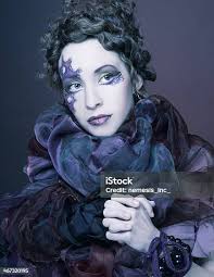 Woman In Violet Stock Photo