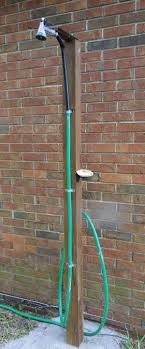Http Www Homejelly Com How To Make Outdoor Shower Using Garden Hose Outdoor Shower Diy Outdoor Shower Outdoor Shower Enclosure