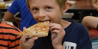 Huron Valley School kids enjoy delivered pizza as a lunch option