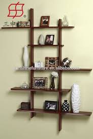 Temukan solusi penyimpanan untuk berbagai sudut di ruang tamu anda, mulai dari rak tv, rak buku, hingga rak dinding yang juga bisa menambah unsur dekoratif bagi hunian anda. Cantik Hiasan Rak Dinding Ruang Tamu Erlie Decor