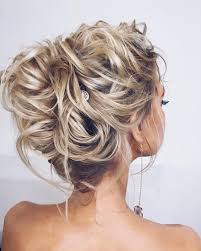 Fabulous Hairstyles For Every Wedding Dress Neckline Whether You Re A Summer Winter Bride Or A De Strapless Dress Hairstyles Bride Hair Down Messy Hairstyles