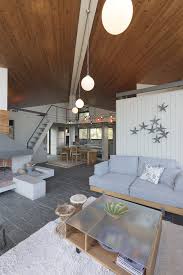 This One Of A Kind Villa In Sithonia Uses Stone Wood And Glass As Its Basic Construction Materials Effortlessly Blending Natural Ideal Home Home Wooden Path