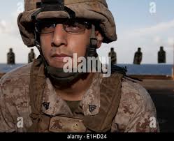 U.S. Marine Corps Sgt. Ryan Pulliam, a combat videographer, Marine  Rotational Force-Southeast Asia, I Marine Expeditionary Force, sights in