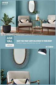 This Coastal Blue Wall Color Looks Equally Elegant And Inviting Making It Per Blue Living Room Color Blue Walls Living Room Living Room Paint Color Ideas Blue