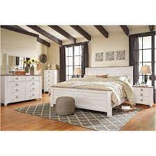Ring pull hardware in an antique brass color, accented with white paint hang up. B267 58 Ashley Furniture Willowton Whitewash King Panel Bed