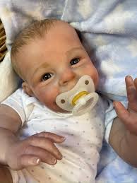 I will have another reborn the same as this one in the photos ready  today….available and a very good price!! This baby will wear Newborn size  clothing and weigh approximately 7.5lbs….the perfect