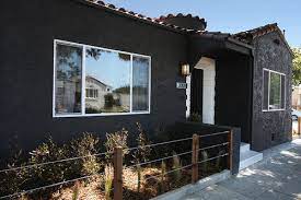 The first floor of the house was painted using distemper paint, but after only four years it was brown instead of black. Paint Your House Black 6 Reasons I Hate This Hot New Trend Realtor Com