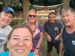 Nearly 100 families in the Summerfield neighborhood have decorated their  homes with lights, wreaths and lawn decorations.