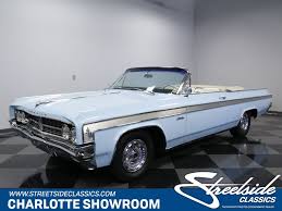 1963 oldsmobile starfire streetside classics the nation s trusted classic car consignment dealer 1963 oldsmobile starfire streetside