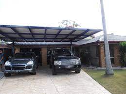 Aussie made & designed carports with free shipping. Carport Solar Panel Structure Cantilevered Steel Carport Doubles Up As A Solar Panel Structure Providing E Pergola Pergola Attached To House Pergola Designs