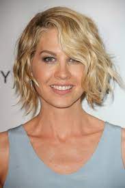 Curl your hair for bouncy layers. Heatless Curls For Short Hair Tips Overnight Curling Techniques Headbands Best No Heat Curlers