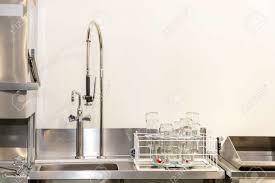 Maybe you would like to learn more about one of these? Commercial Kitchen Sink With Sprayer Faucet In Restaurant Stock Photo Picture And Royalty Free Image Image 152889074