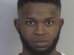 Two charged in fatal shooting